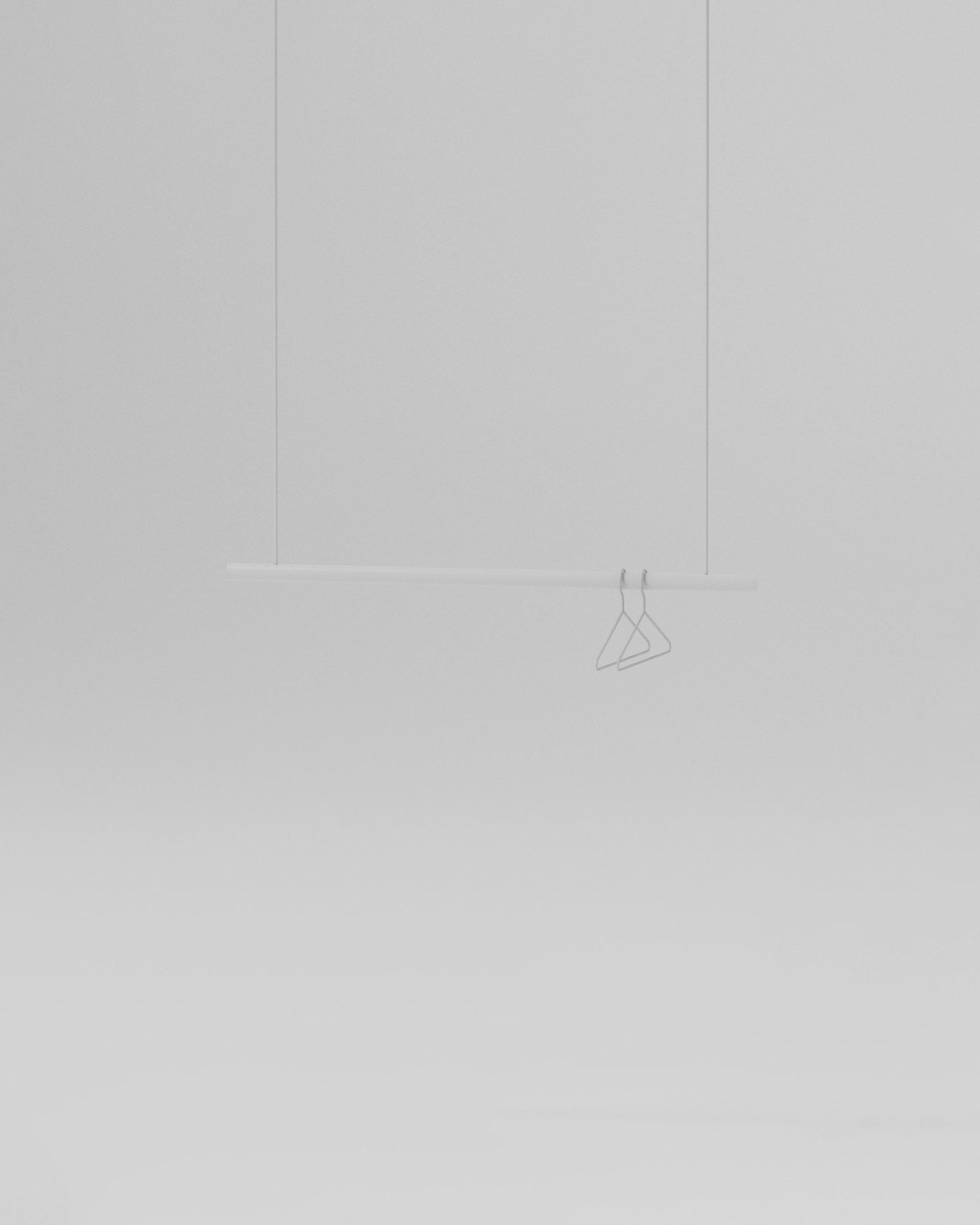 White metal garment racks