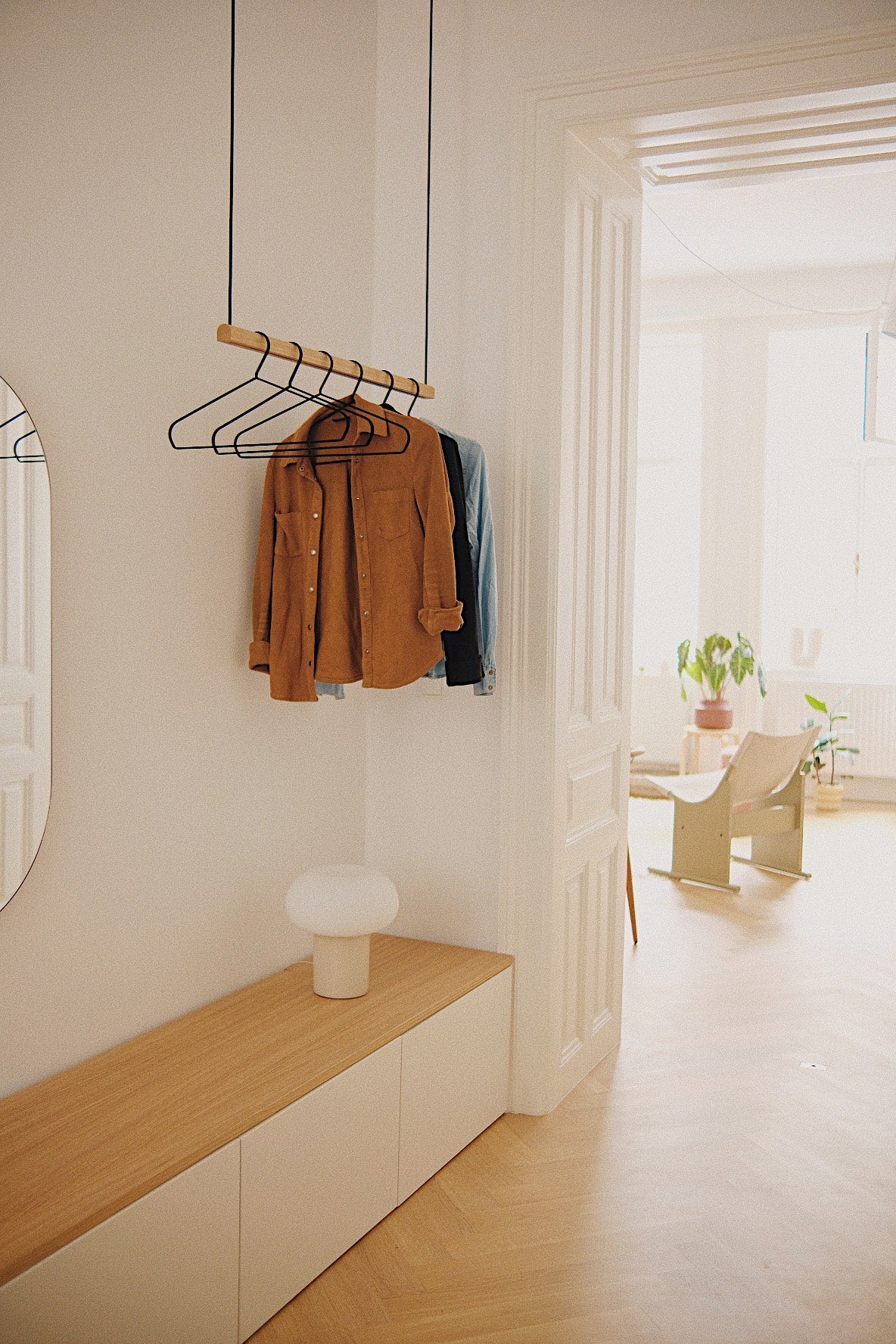 Hanger with clothes in a modern interior setting