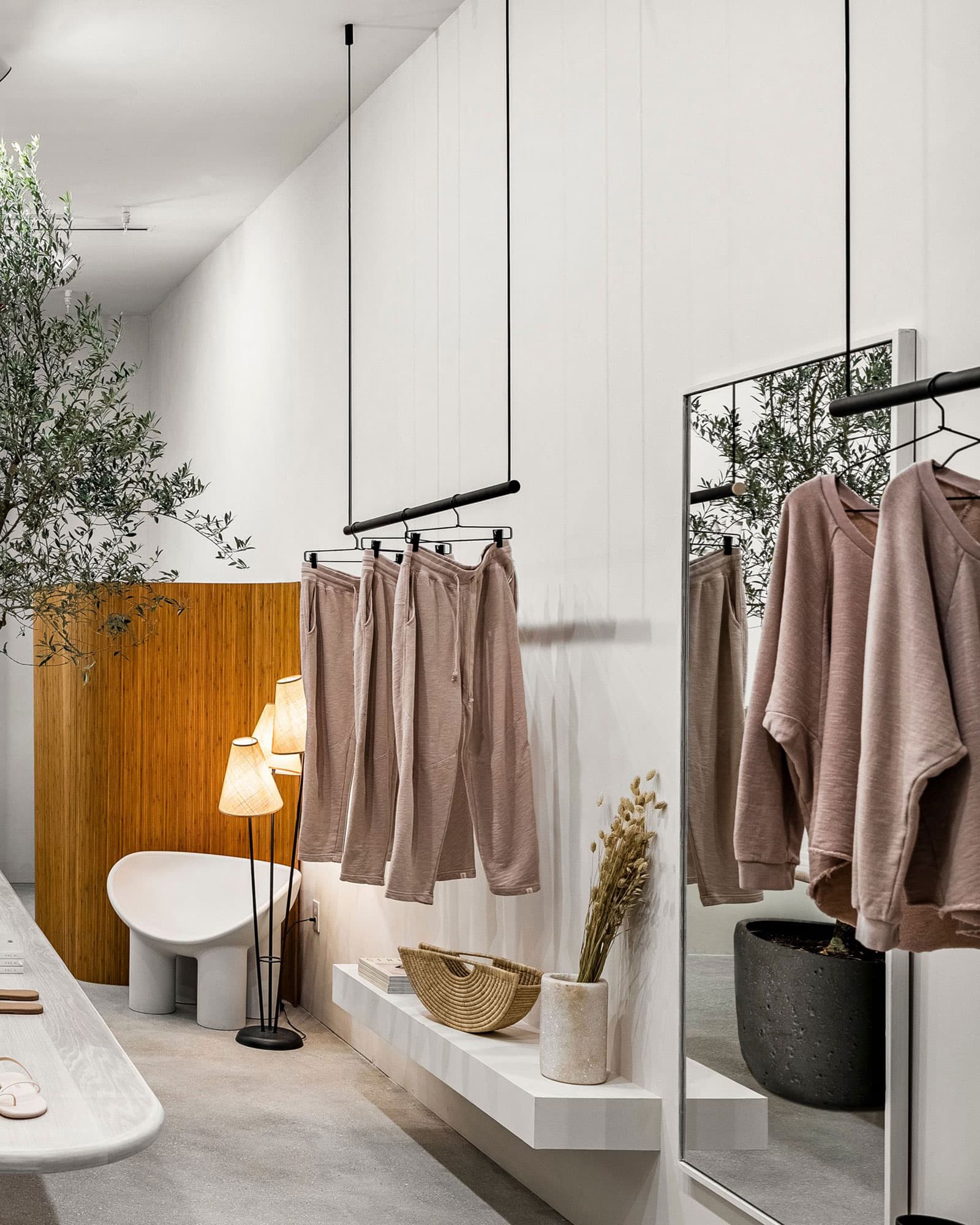 Modern retail store with clothes rack displays